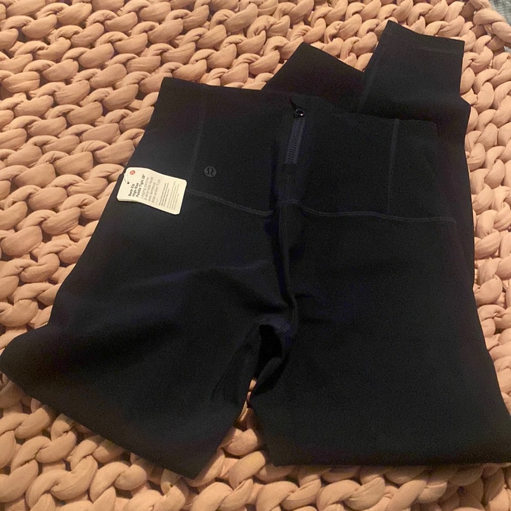 Brand NEW Lululemon high-rise tights in navy blue